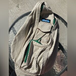 Kavu Cream Polka Dot Sling Bag with Green Zipper Accents